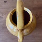 Jug or chevrette in yellow glazed stoneware