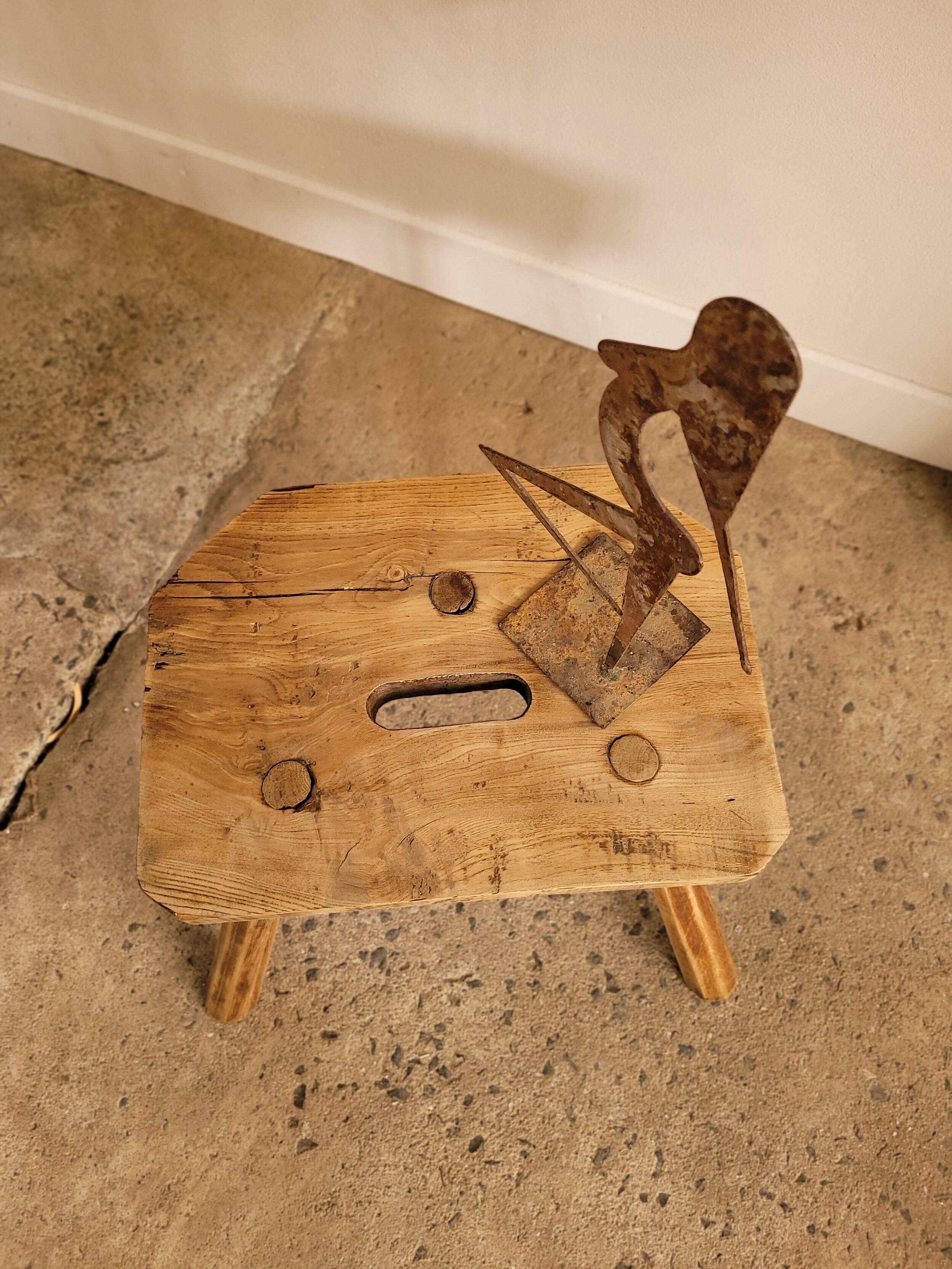 Small brutalist wooden stool