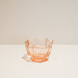 Empty pink glass jar pocket