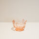 Empty pink glass jar pocket