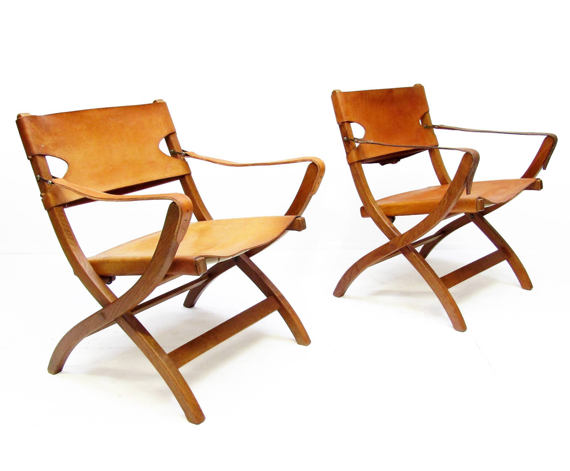Two 1950s Danish Safari Chairs In Oak & Hide Leather by Poul Hundevad