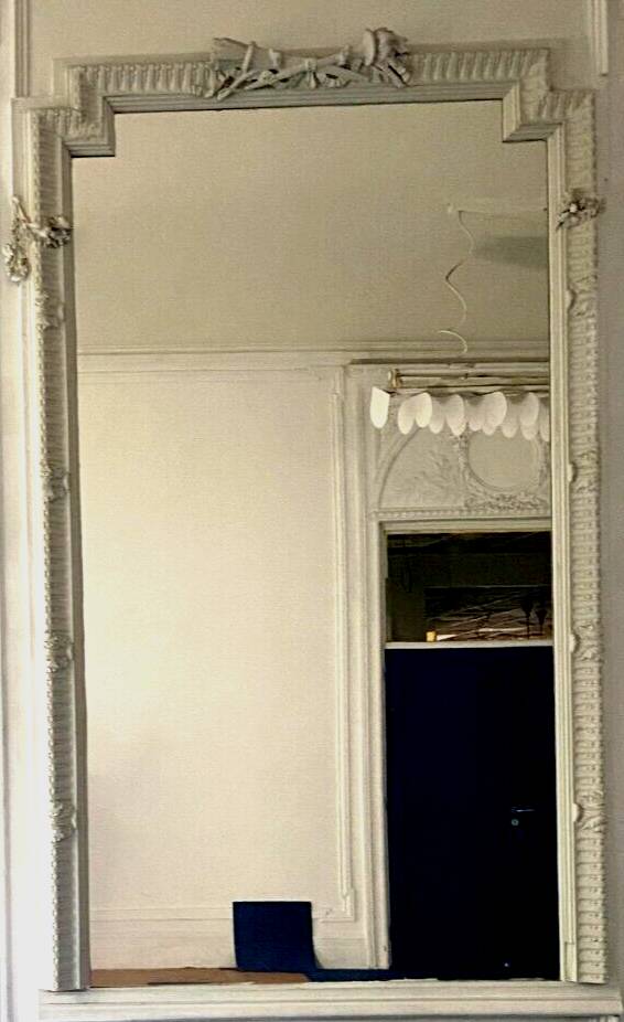 Louis XVI style mirror in wood and carved stucco 20th century