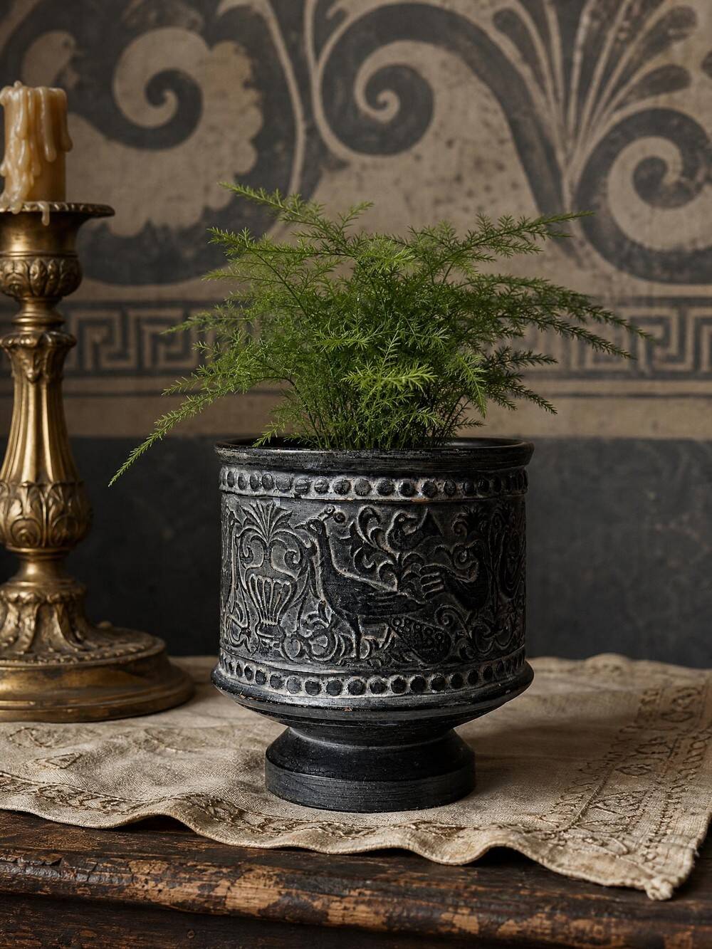 Small Greek pot in black terracotta with animal decoration, craftsmanship from 1960-80.