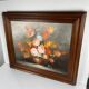 Vintage decorative table featuring a floral still life, signed Frederik.