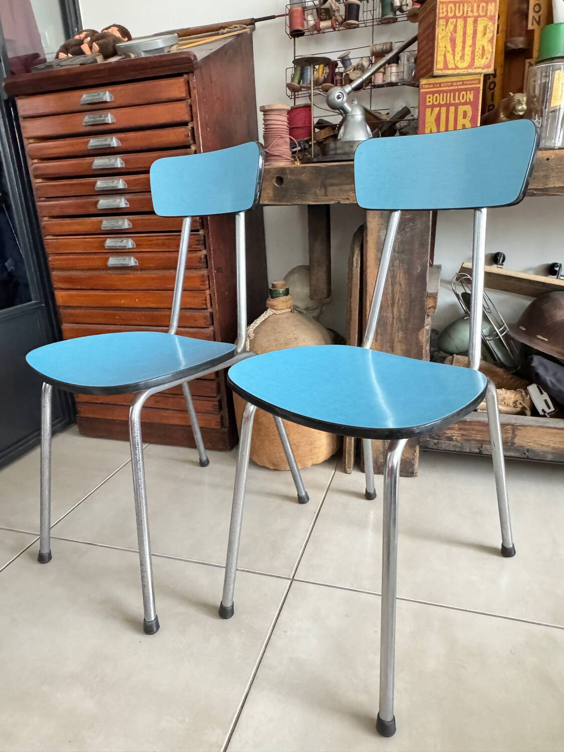 Pair of vintage blue Formica chairs