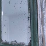 Beveled mirror patinated wood early 20th century