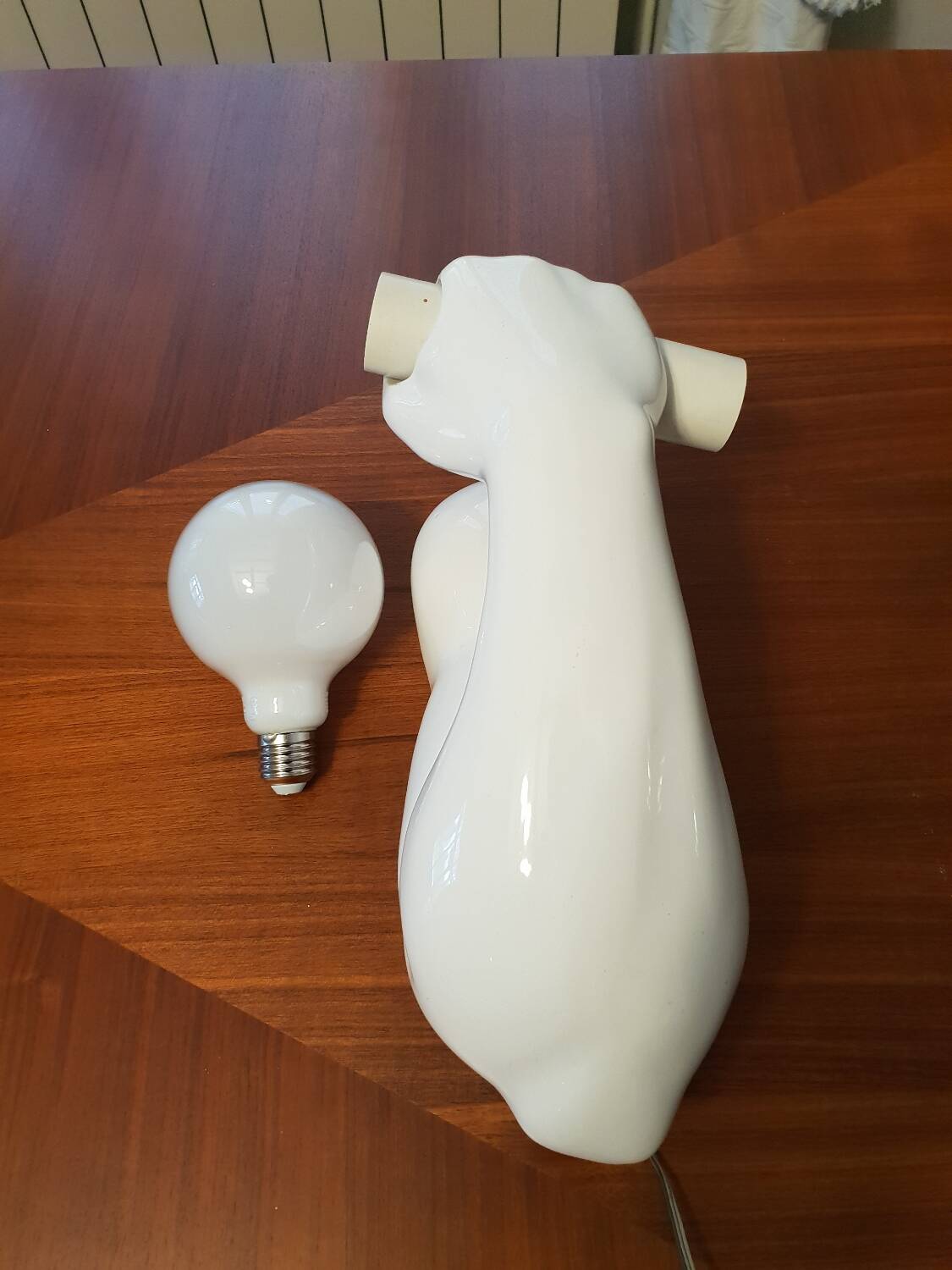 Applique biceps en céramique 1980