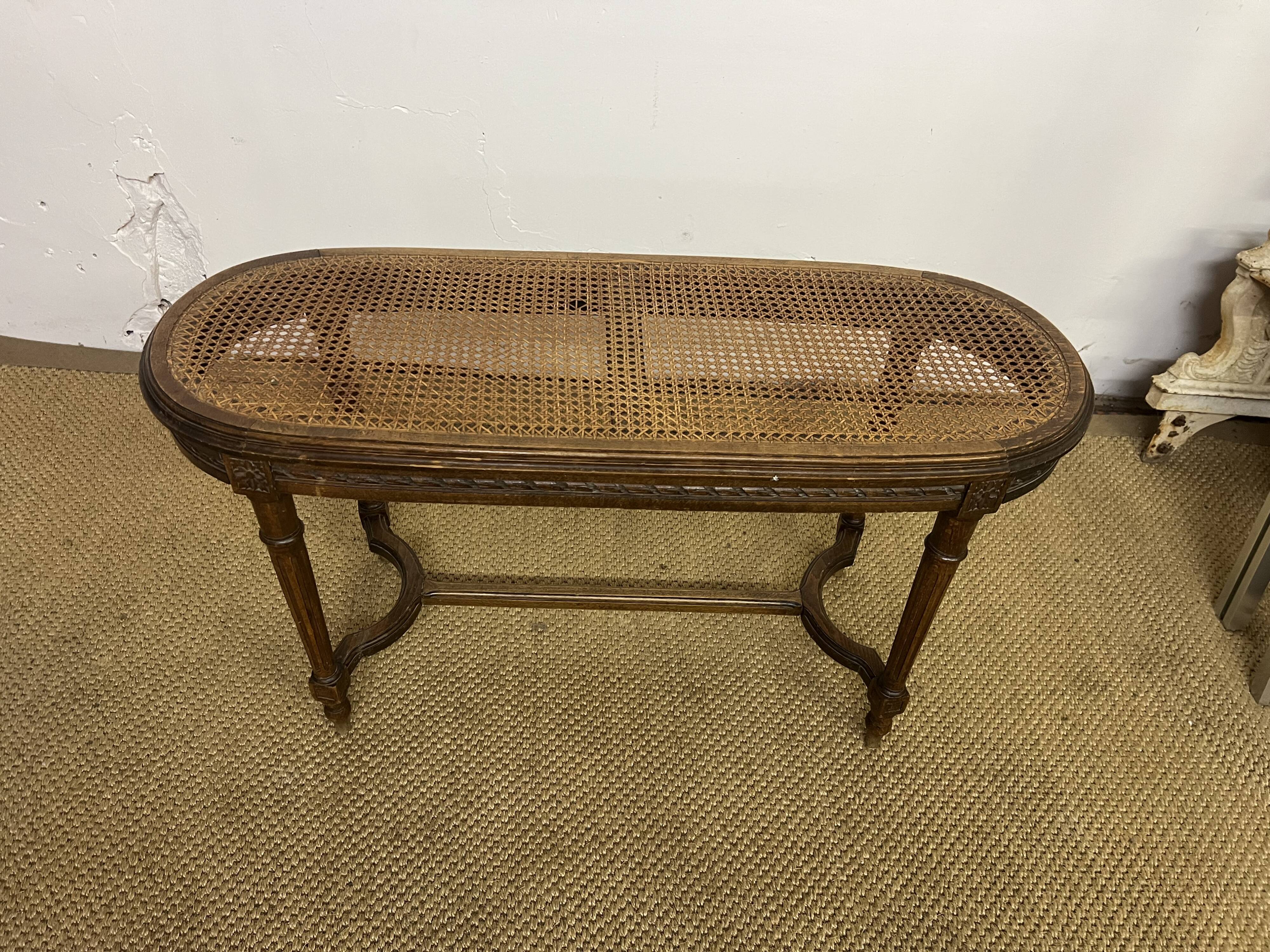 Louis XVI piano bench with caning