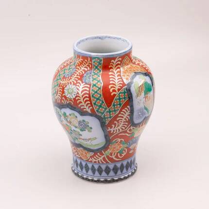 Vintage porcelain vase in the style of Imari by Petrus Regout Maastricht.