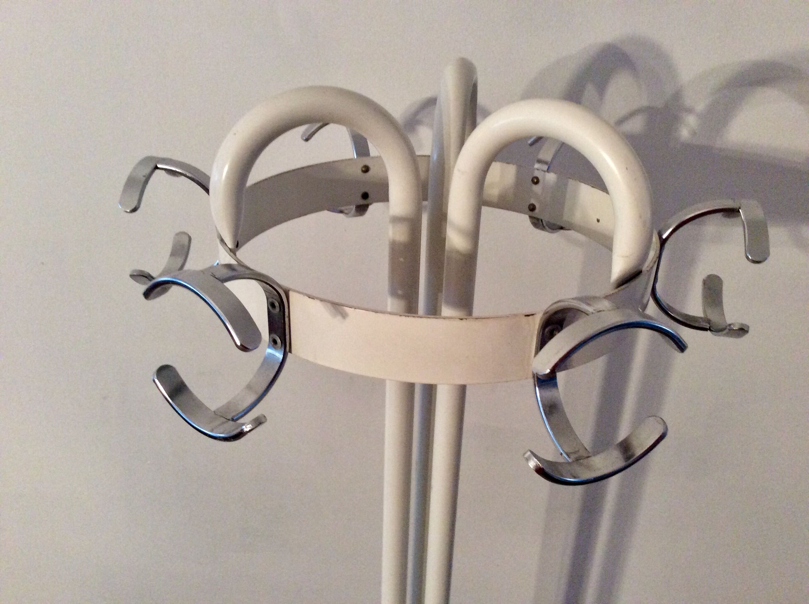 Vintage metal coat rack on foot