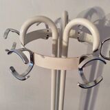 Vintage metal coat rack on foot