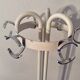Vintage metal coat rack on foot