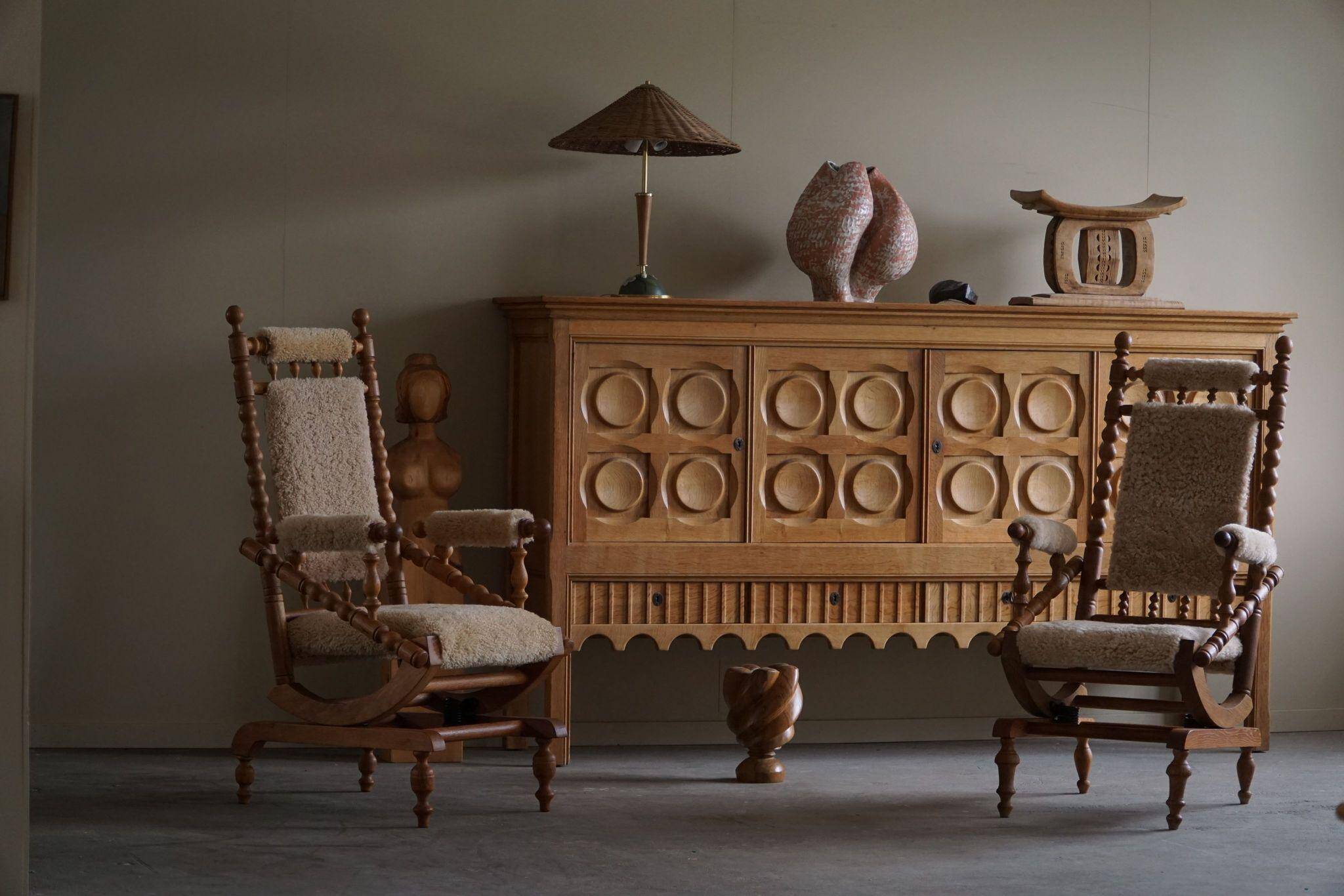 Pair of sculptural Danish modern rocking chairs in lambswool and oak, brutalist, 1950.