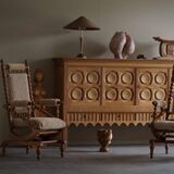 Pair of sculptural Danish modern rocking chairs in lambswool and oak, brutalist, 1950.