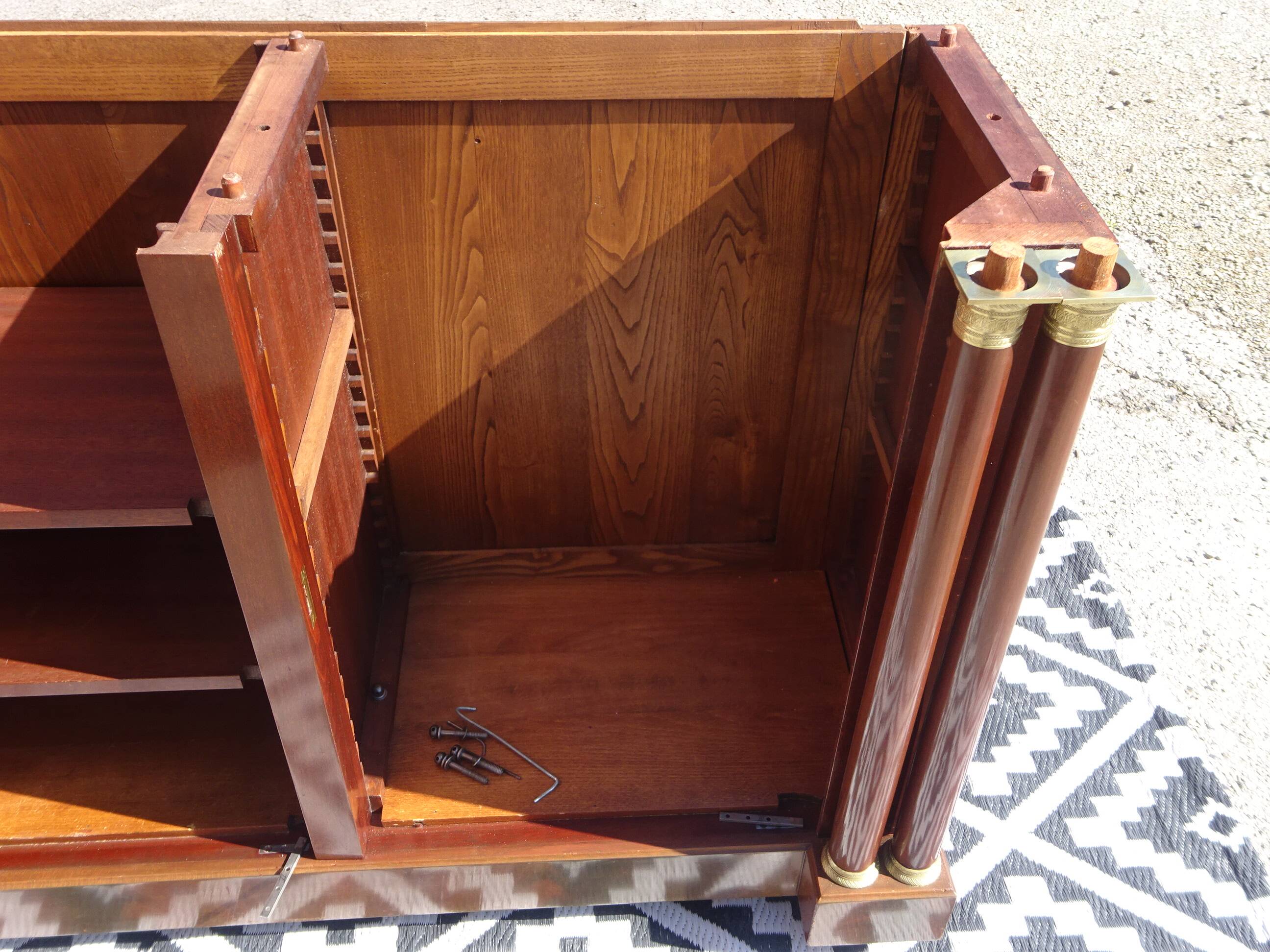 Flamed mahogany enfilade with sea green marble in Empire style.