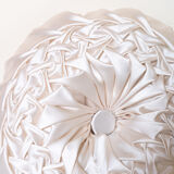 Old round cushion in white, beige pleated silk