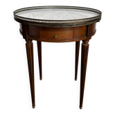 Louis XVI style bouillotte table in mahogany, white marble, and brass.