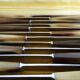 12 old Art Deco horn and stainless steel knives in case