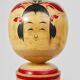 Decorative Naruko Kokeshi doll sculpture from northern Japan, hand-painted.