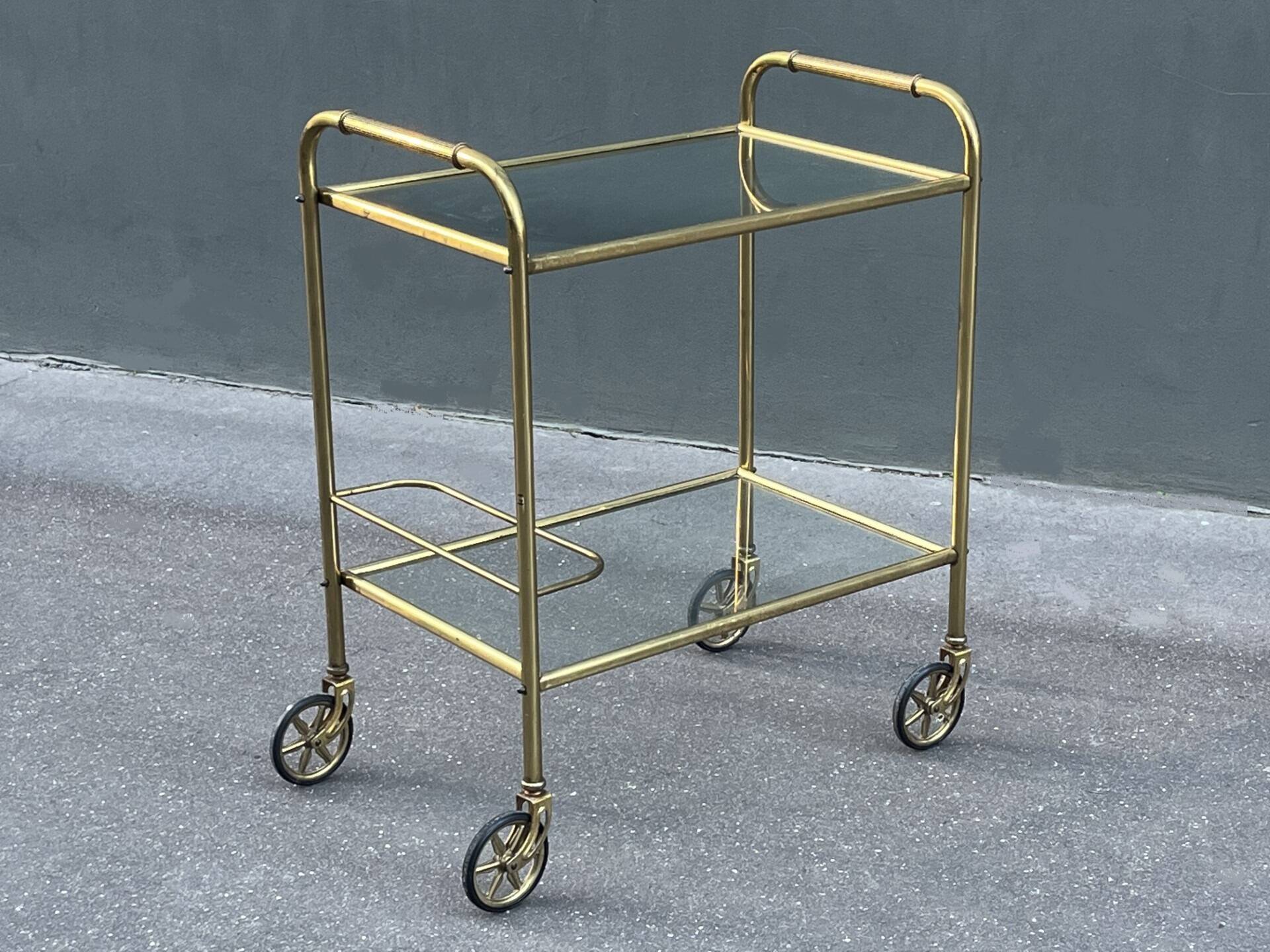 Minimalist solid brass server from the 60s