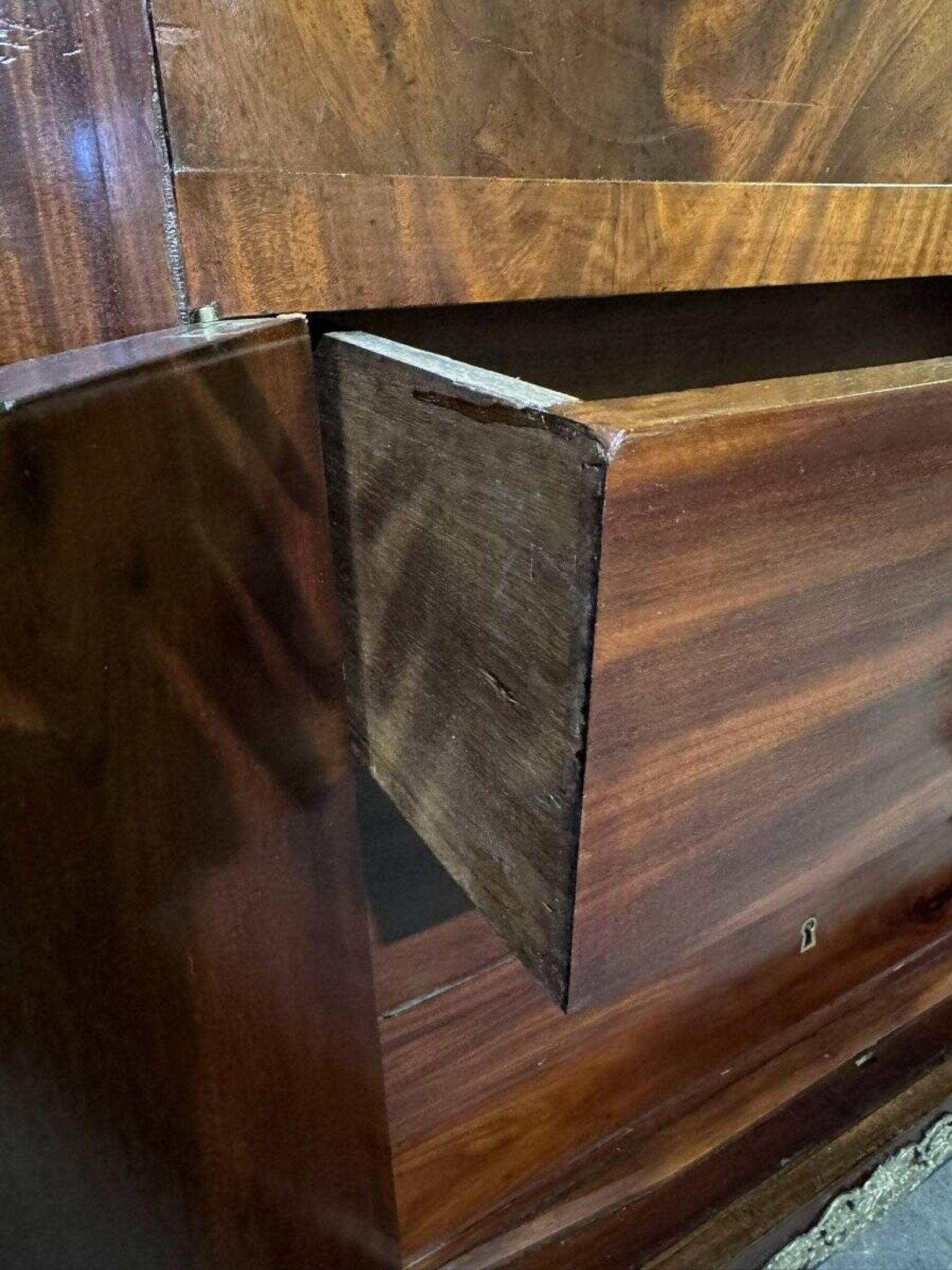 Rare Empire period mahogany secretary with four columns topped with bronze capitals.
