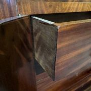 Rare Empire period mahogany secretary with four columns topped with bronze capitals.