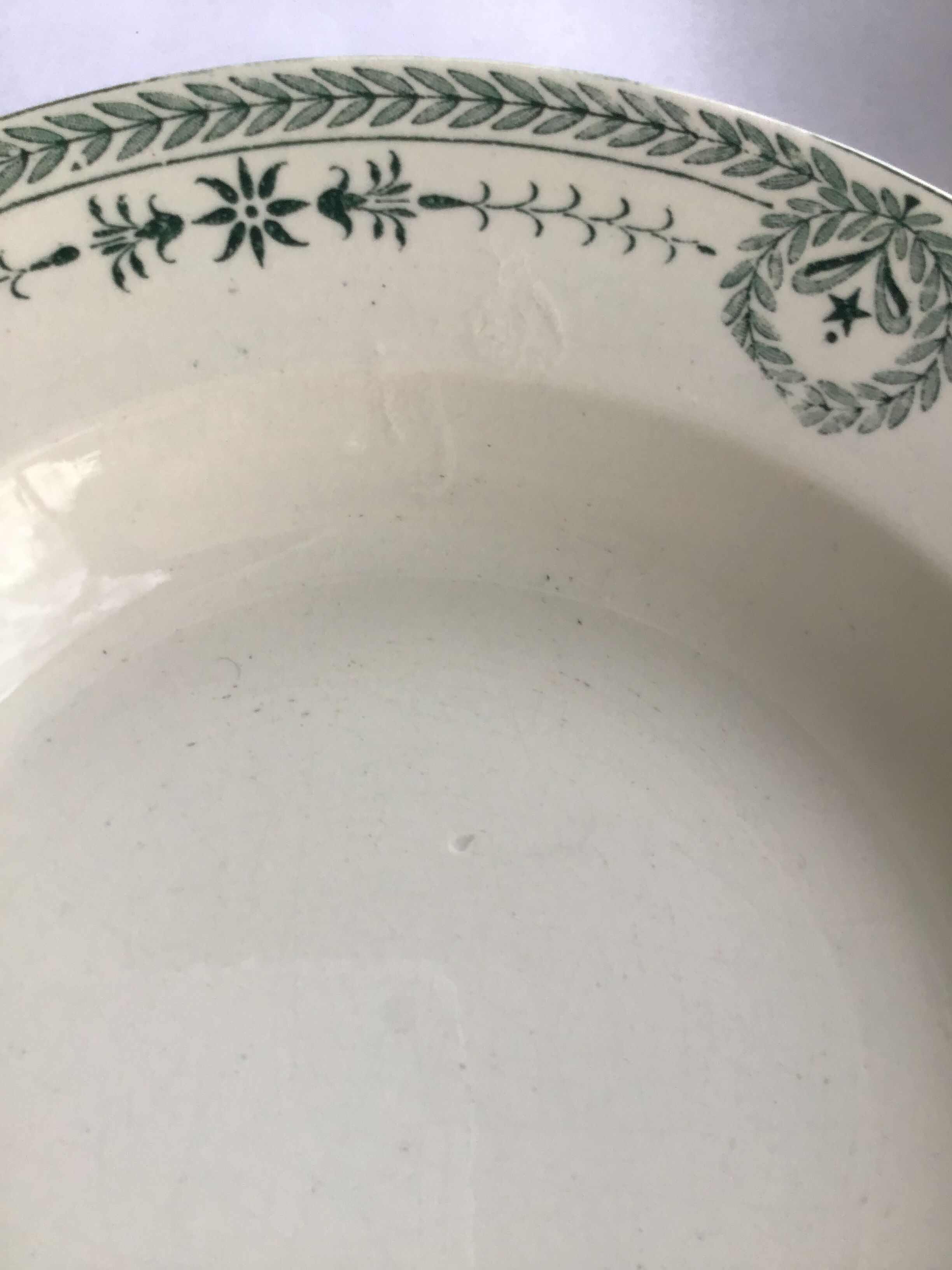 7 Old dark green Digoin hollow plates