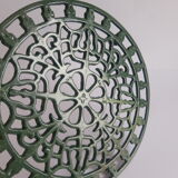 Vintage green cast iron trivet
