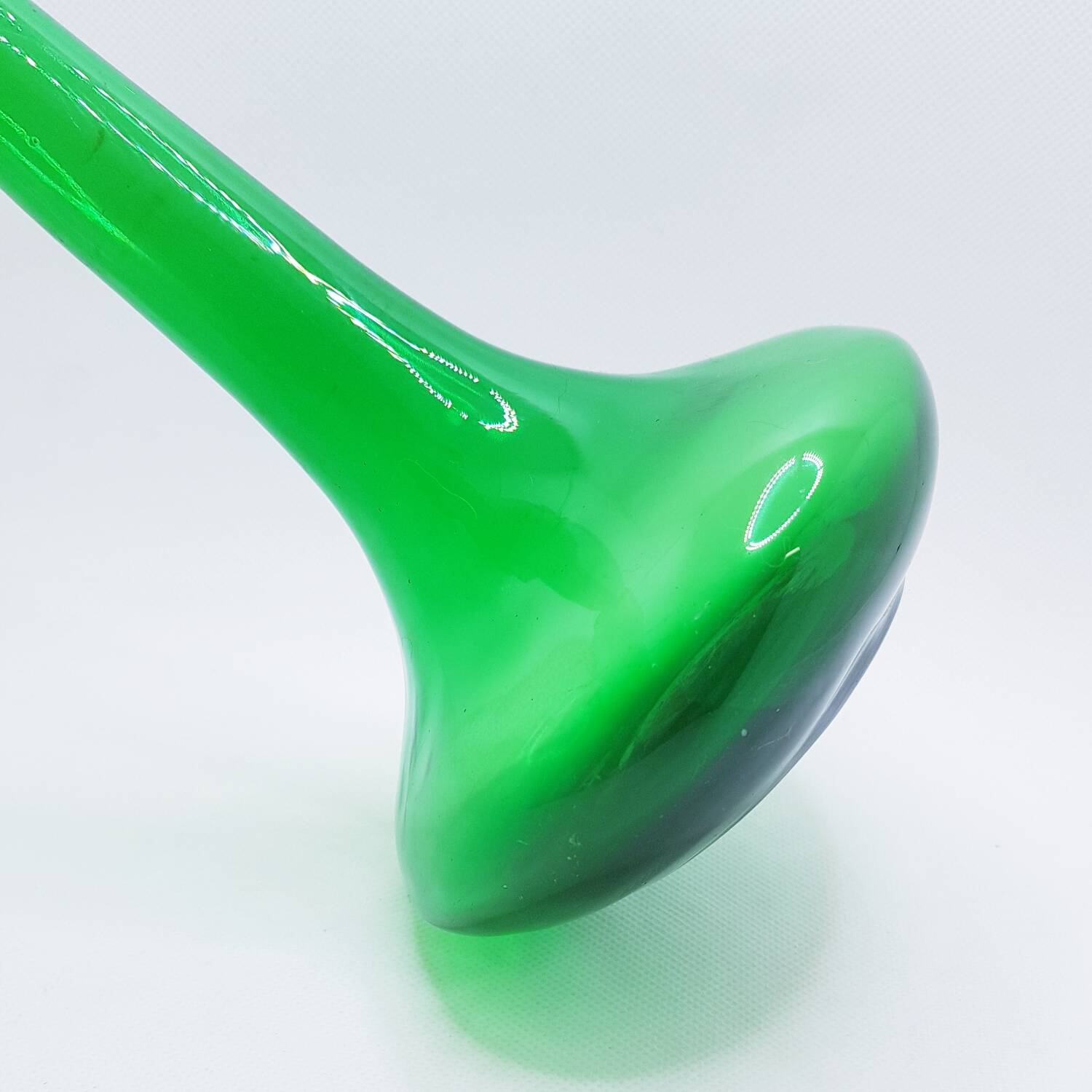 Tall green glass bud vase