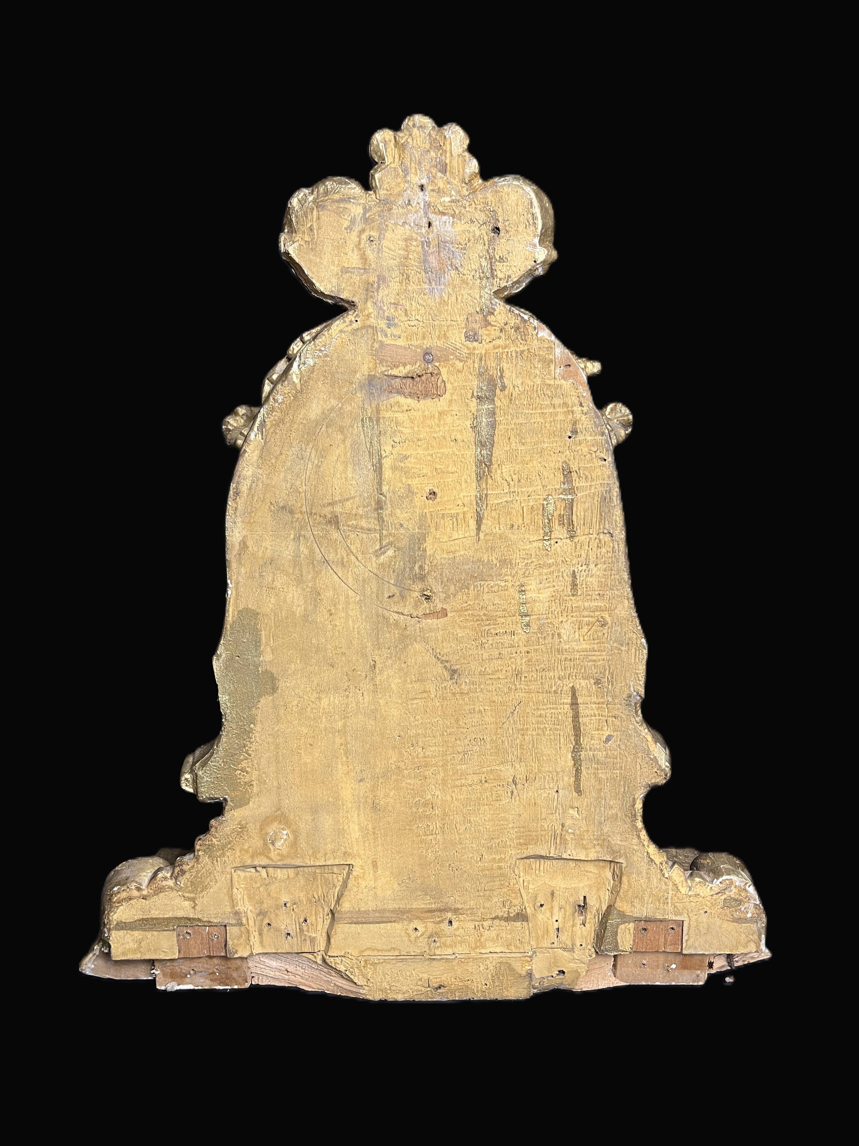 Church wall console shelf in carved gilded wood, 19th century.
