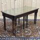 English nesting tables in mahogany and leather top under glass - work from the 1950s