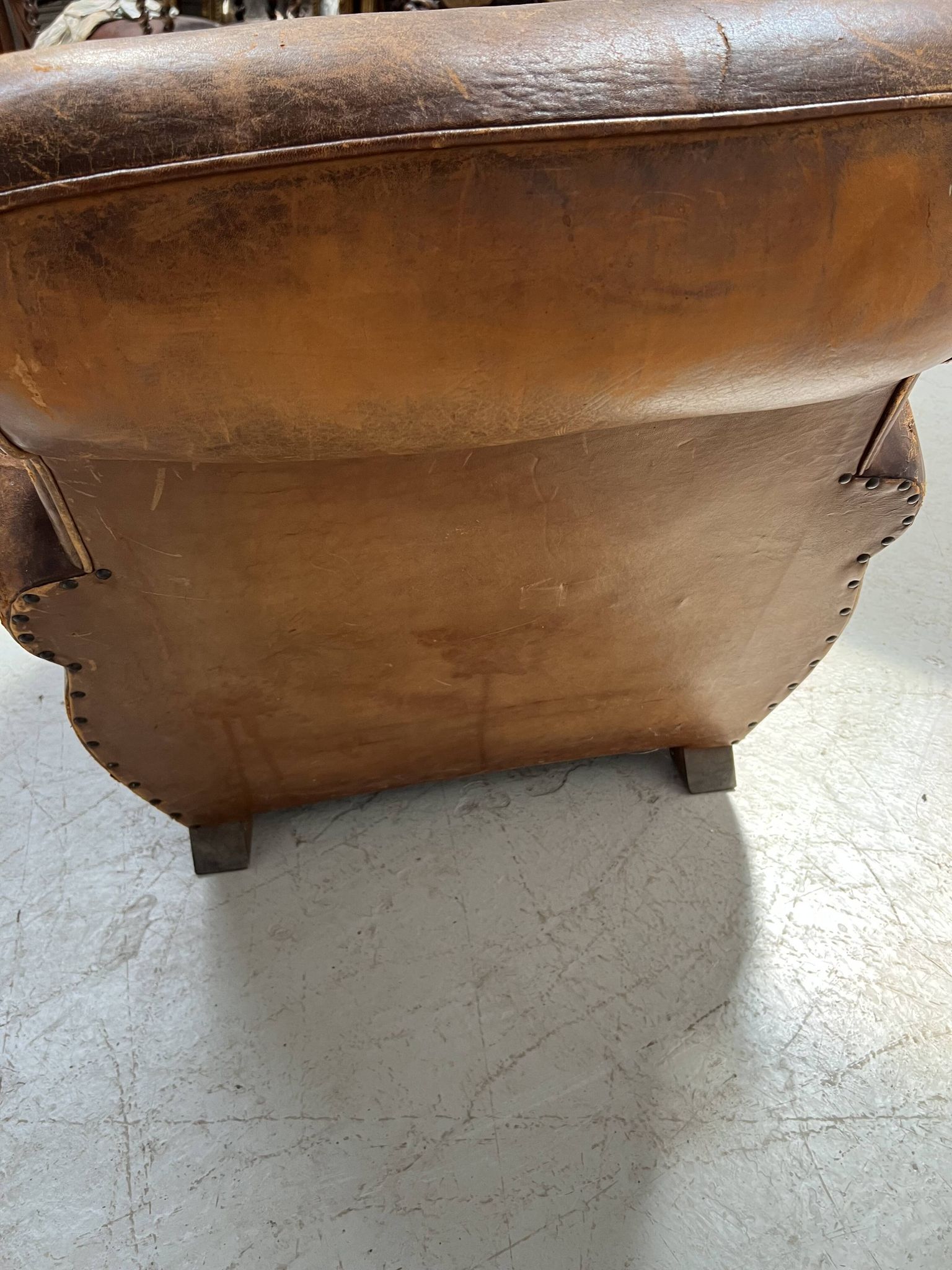 Antique 20th century tan leather club armchair
