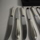 12 SFAM cheese knives in its dark chocolate case