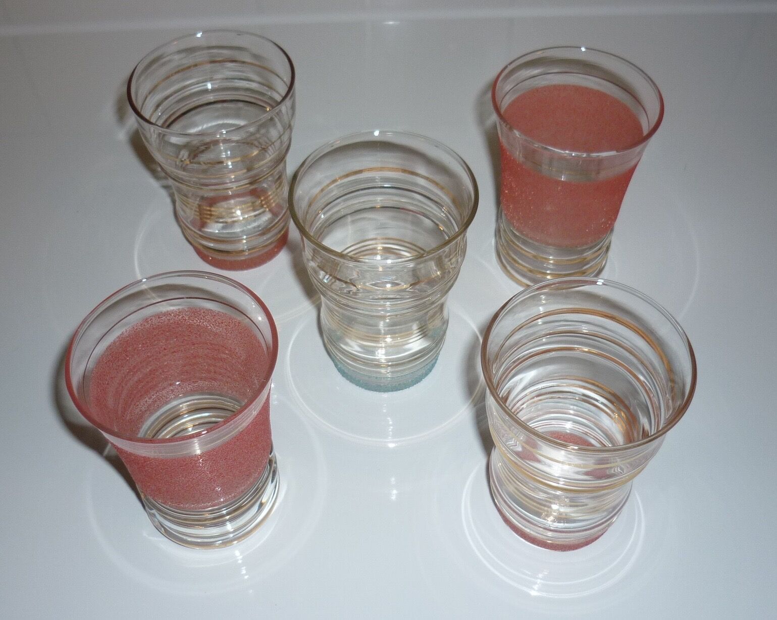 5 coloured glasses and gold edges