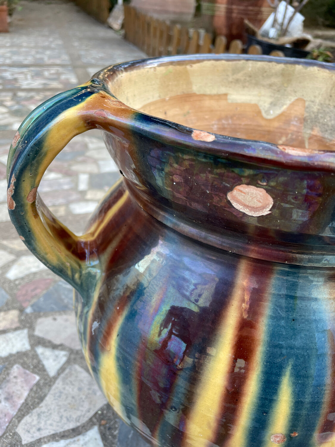 Old flower jar with two glazed earth handles