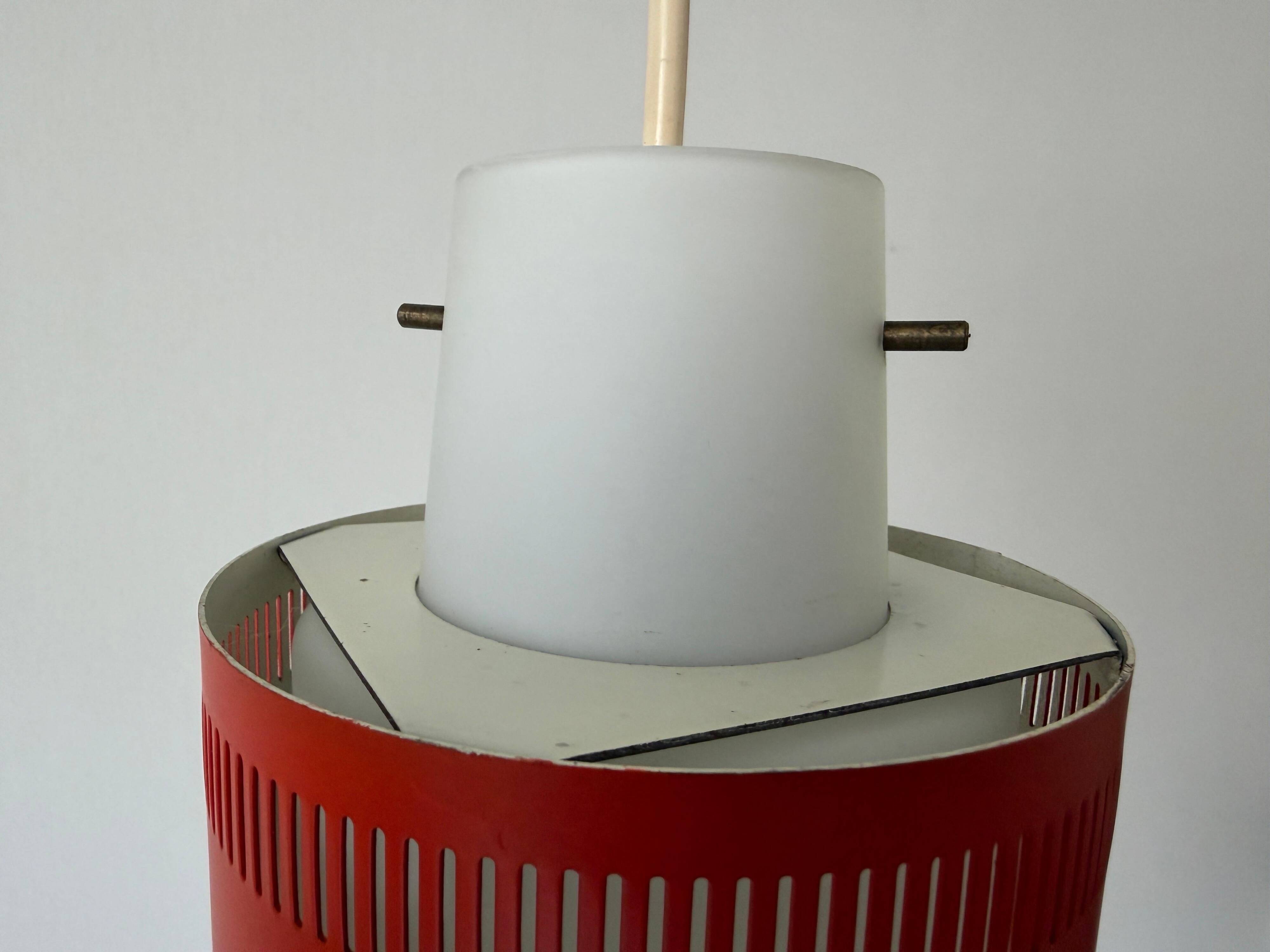 Glass ceiling light with an orange metal frame, 1960s, Germany.