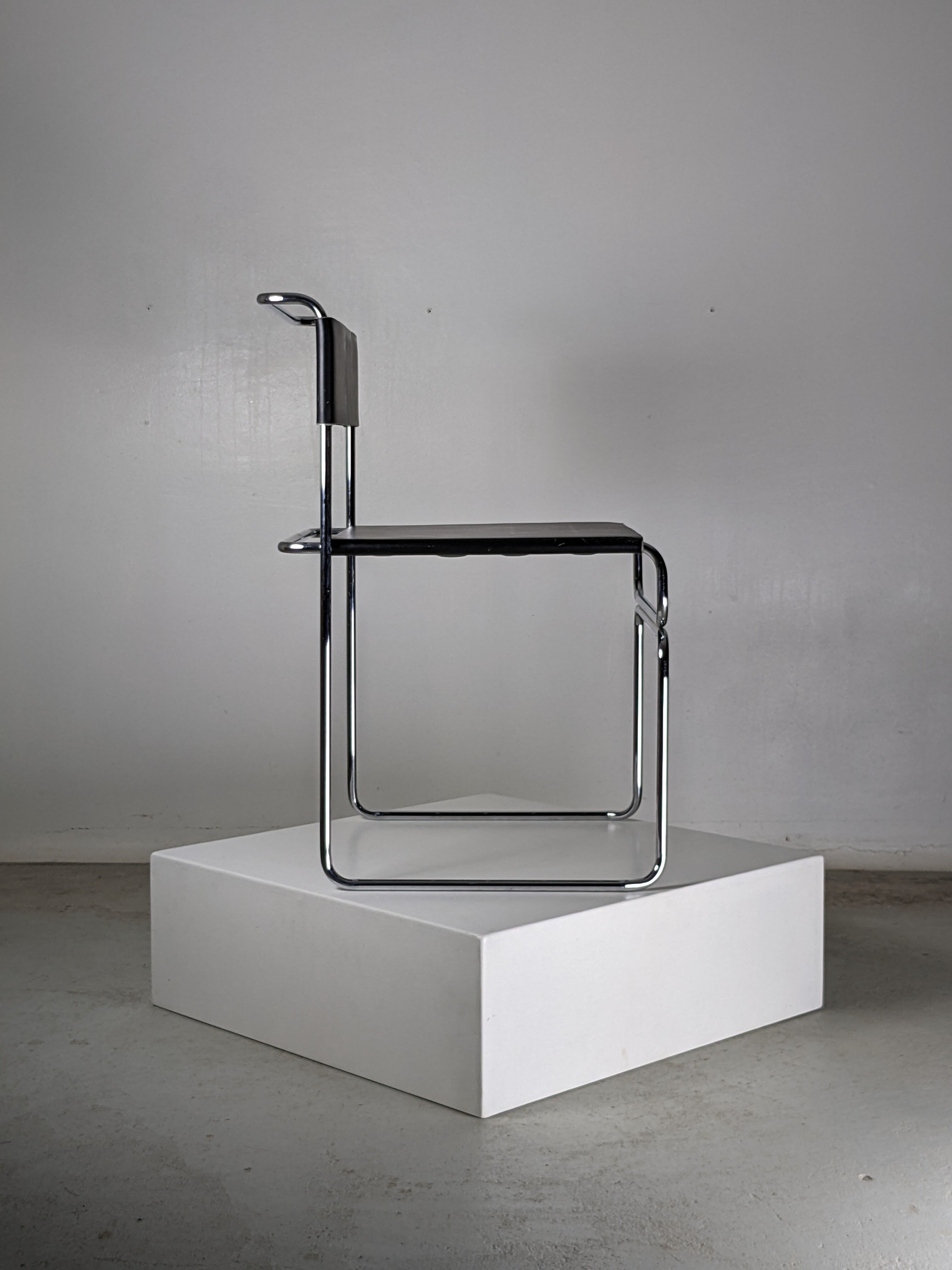 Suite of 4 chairs in chromed metal and leather by Giovanni Carini for Planula - 70s