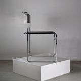 Suite of 4 chairs in chromed metal and leather by Giovanni Carini for Planula - 70s