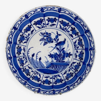 18th century Delft blue earthenware dish decorated with flowers and birds