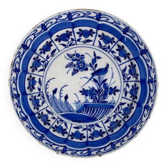 18th century Delft blue earthenware dish decorated with flowers and birds
