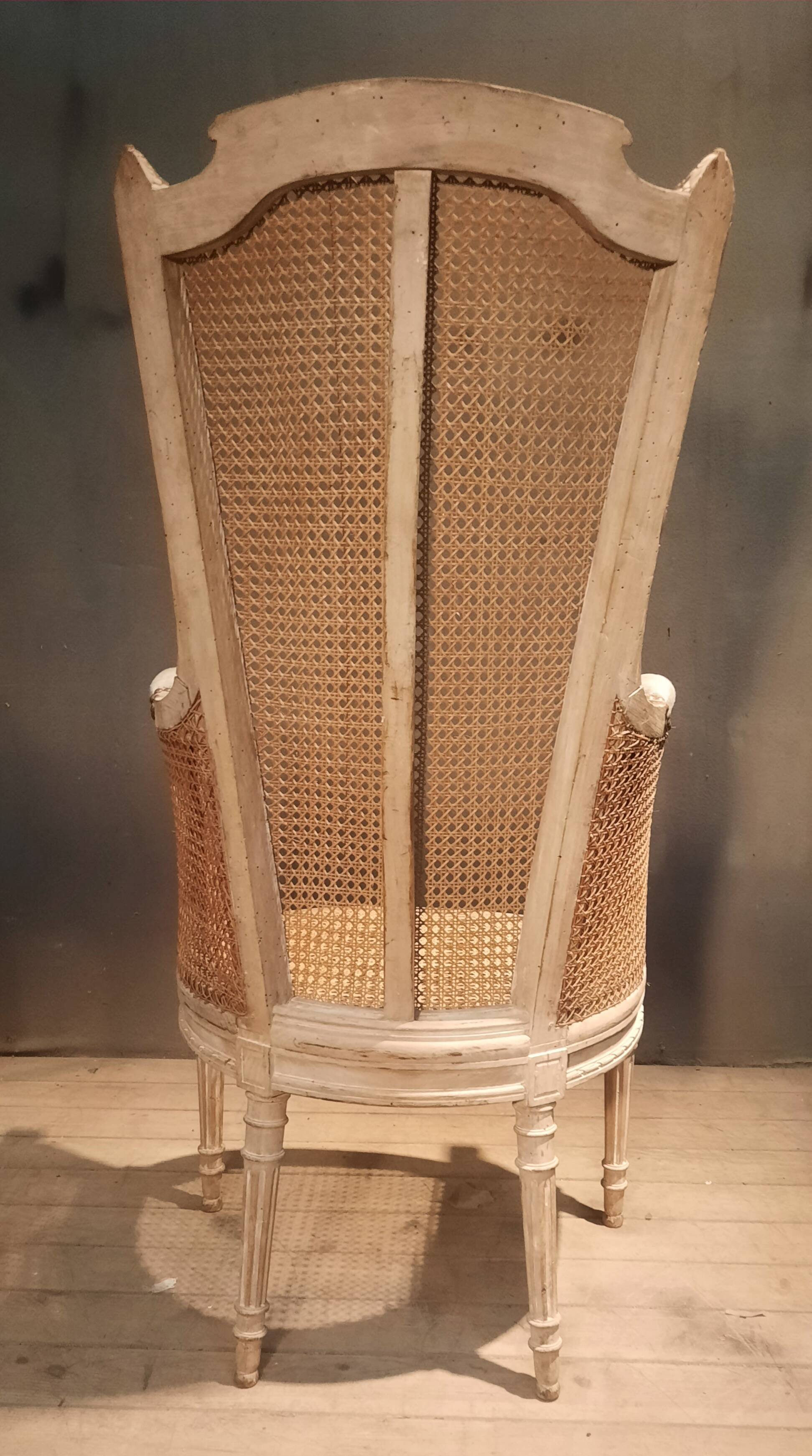 Louis XVI high-backed caned armchair