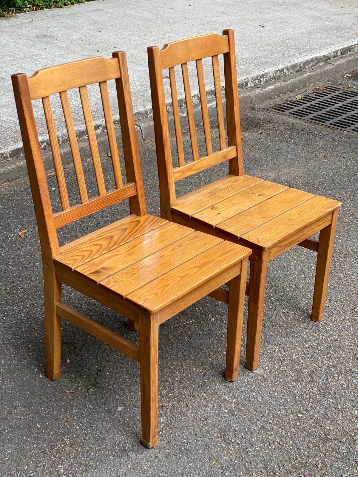 2 solid wood dining chairs