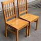 2 solid wood dining chairs