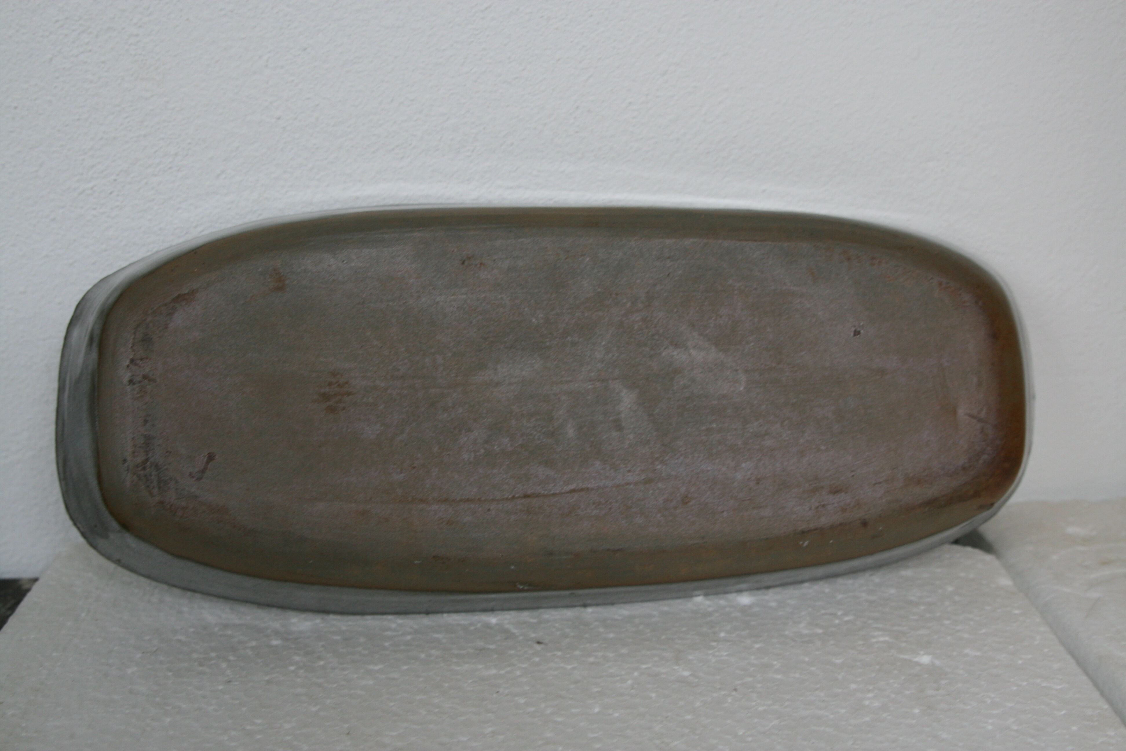 Flat in brown grey gres
