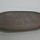 Flat in brown grey gres