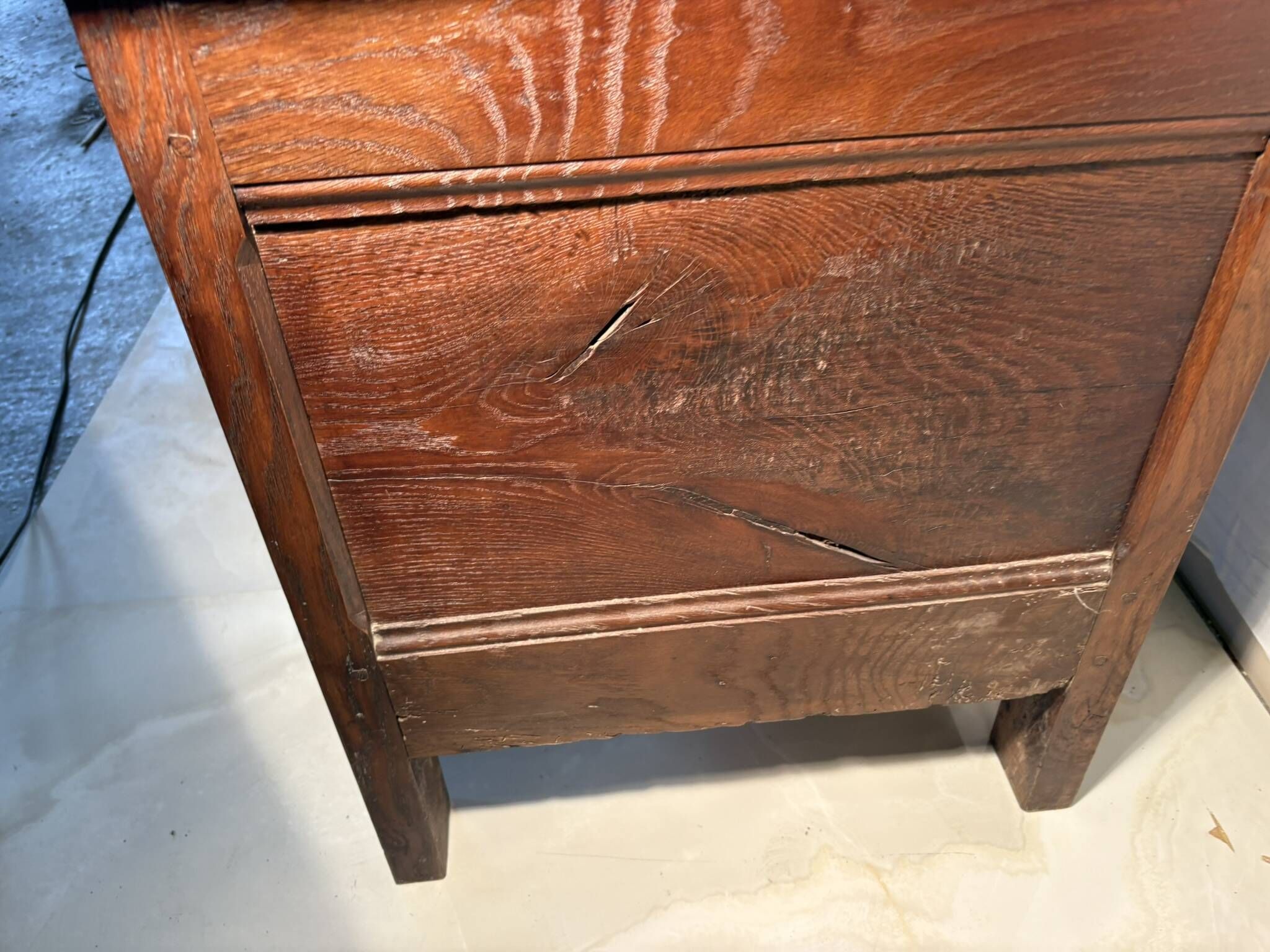 Rustic antique oak chest, original fittings and moulded panels.