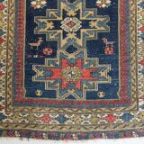 Antique tissé à la main - Tapis persan à fond bleu avec des figures ressemblant à des oiseaux