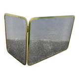 Fireplace screen with 2 panels in gilded brass and expanded metal, 1970s.