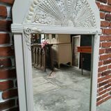 White and gold patinated sculpted mirror