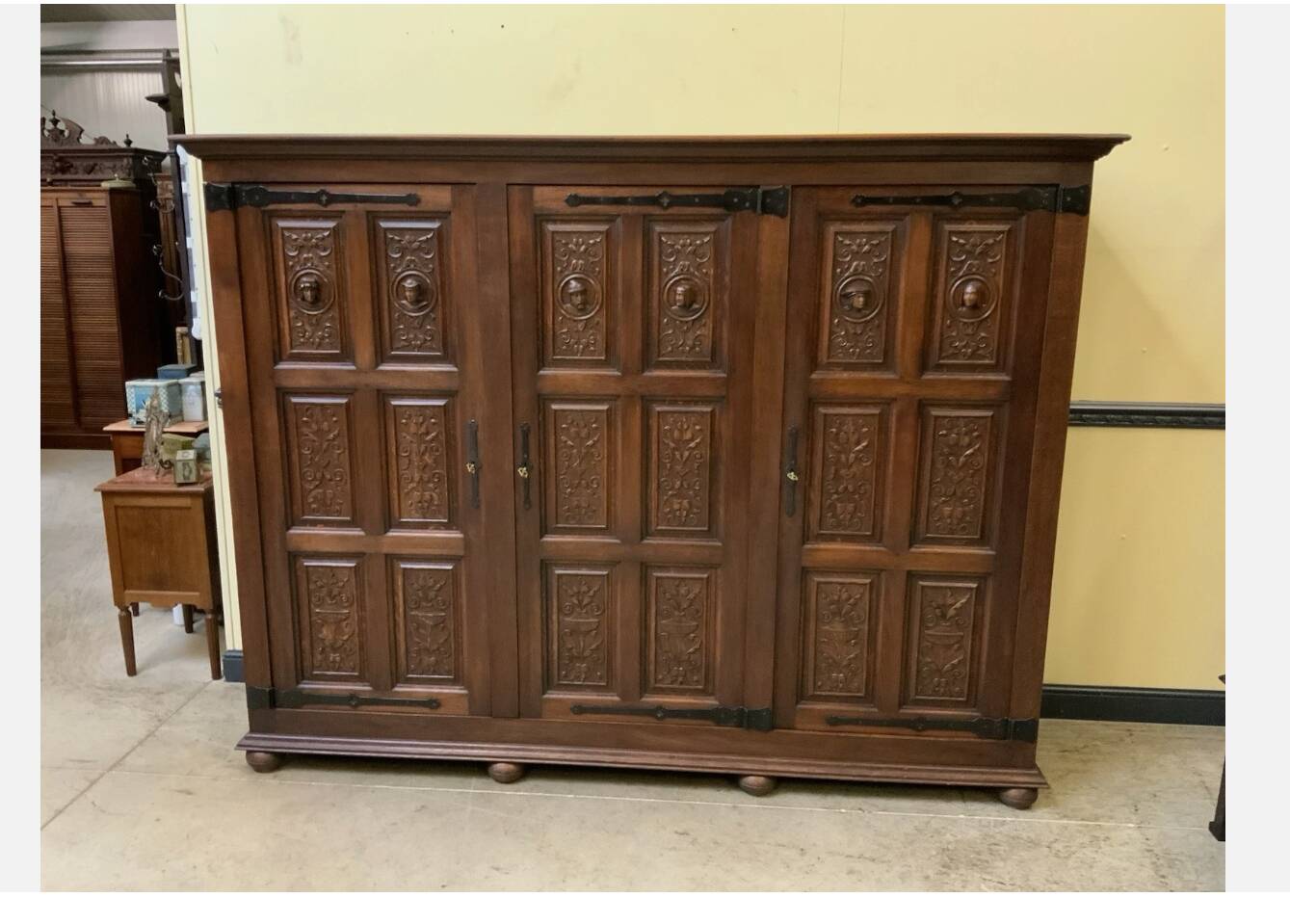 Antique neo-Gothic wardrobe with linen drawers.
